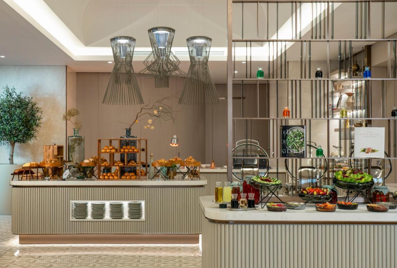 Address Istanbul Hotell Exteriör bild The buffet at the hotel